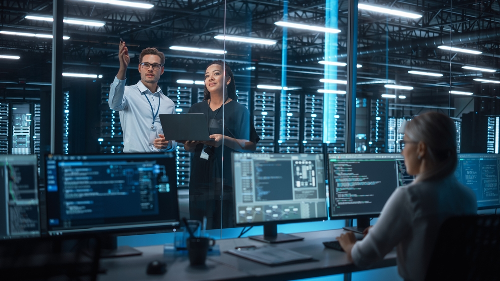 Female,E-business,Entrepreneur,And,Male,It,Specialist,Discussing,Something,And